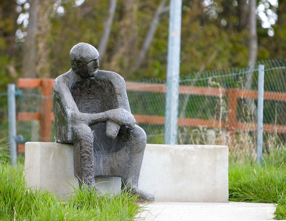 photo of seated figure